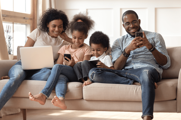 Man with his family enjoying some social media time